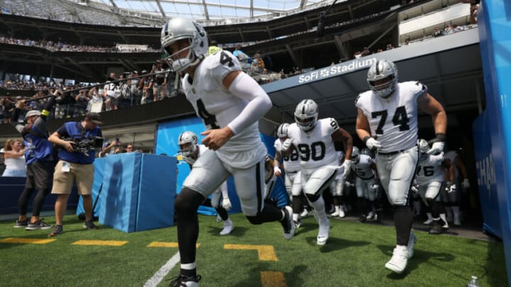 INGLEWOOD, CALIFORNIA - SEPTEMBER 11: Quarterback Derek Carr #4 of the Las Vegas Raiders runs onto the field before his team's game against the Los Angeles Chargers at SoFi Stadium on September 11, 2022 in Inglewood, California. (Photo by Harry How/Getty Images)