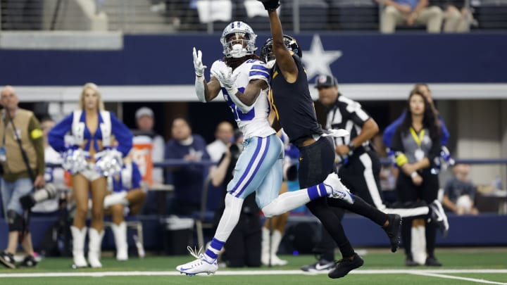 ARLINGTON, TEXAS – OCTOBER 02: William Jackson III #3 of the Washington Commanders breaks up a pass intended for CeeDee Lamb #88 of the Dallas Cowboys during the second half at AT&T Stadium on October 02, 2022, in Arlington, Texas. (Photo by Wesley Hitt/Getty Images)