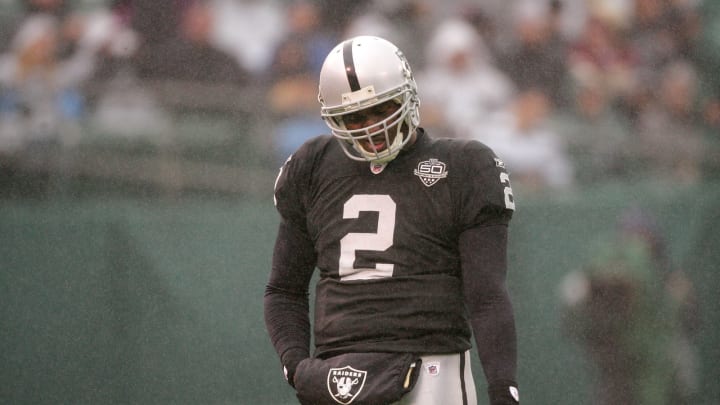 OAKLAND, CA – DECEMBER 13: JaMarcus Russell #2 of the Oakland Raiders walks off the field after calling a time out during their game against the Washington Redskins at Oakland-Alameda County Coliseum on December 13, 2009 in Oakland, California. (Photo by Ezra Shaw/Getty Images)