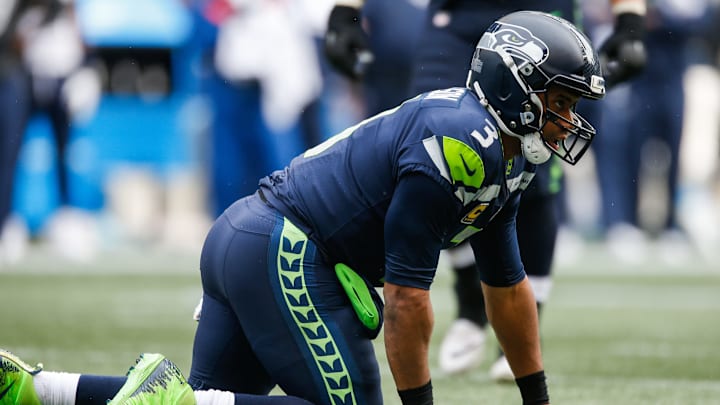 SEATTLE, WA – OCTOBER 07: Quarterback Russell Wilson #3 of the Seattle Seahawks on the ground in the second half against the Los Angeles Rams at CenturyLink Field on October 7, 2018 in Seattle, Washington. (Photo by Otto Greule Jr/Getty Images)