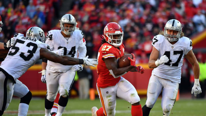 KANSAS CITY, MO – DECEMBER 10: Running back Kareem Hunt #27 of the Kansas City Chiefs carries the ball during the game against the Oakland Raiders at Arrowhead Stadium on December 10, 2017 in Kansas City, Missouri. (Photo by Peter Aiken/Getty Images)