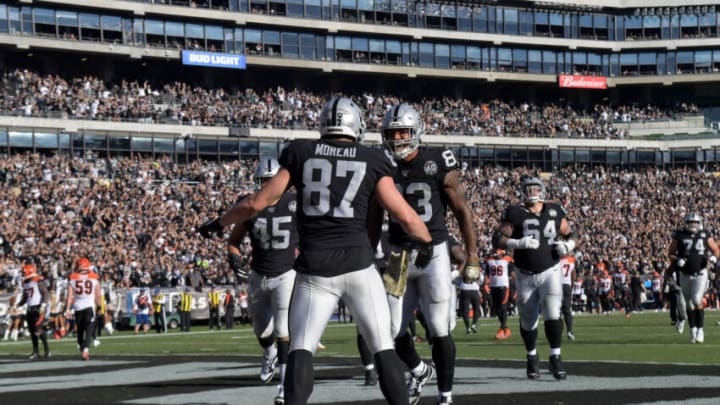 Darren Waller of the Las Vegas Raiders celebrates a touchdown with