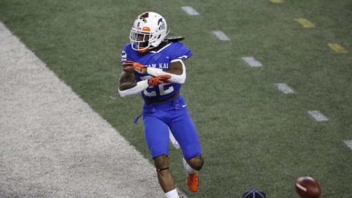 Jan 31, 2021; Honolulu, Hawaii, USA; Team Kai defensive back Nate Hobbs of Illinois (22) reacts after Team Aina attempted a two-point play to tie the game during the second half at the Hula Bowl. Team Kai won 15-13. Mandatory Credit: Marco Garcia-USA TODAY Sports