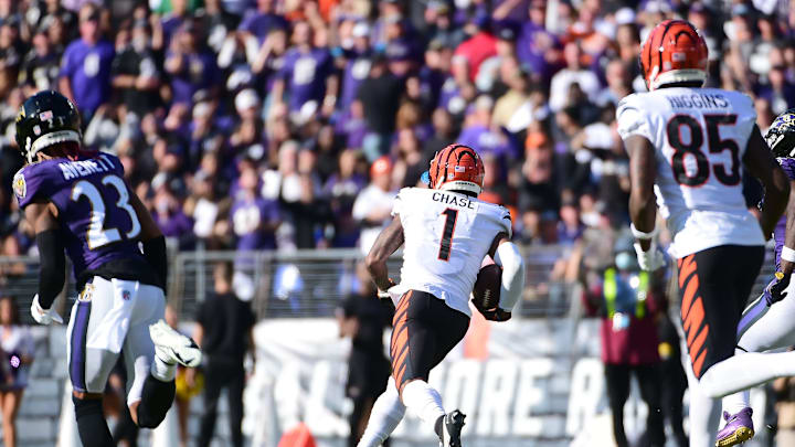 Oct 24, 2021; Baltimore, Maryland, USA; Cincinnati Bengals wide receiver Ja’Marr Chase (1) runs with the ball while scoring a touchdown in the third quarter against the Baltimore Ravens at M&T Bank Stadium. Mandatory Credit: Evan Habeeb-USA TODAY Sports