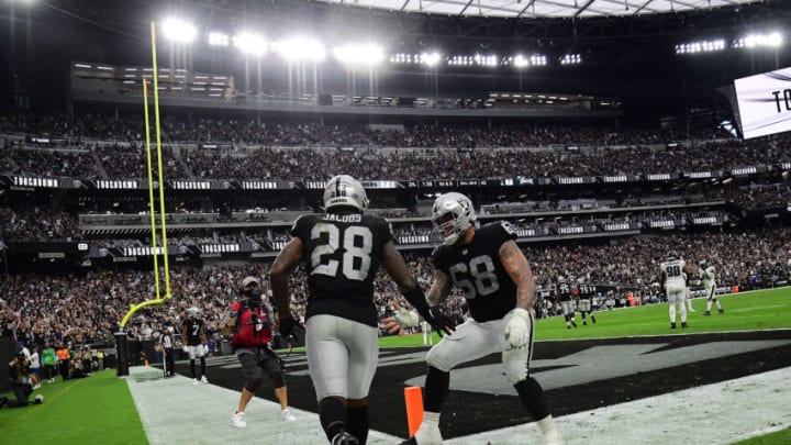 Oct 24, 2021; Paradise, Nevada, USA; Las Vegas Raiders center Andre James (68) celebrates the touchdown scored by running back Josh Jacobs (28) during the first half at Allegiant Stadium. Mandatory Credit: Gary A. Vasquez-USA TODAY Sports