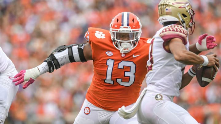 Clemson defensive tackle Tyler Davis (13) pressures Florida State quarterback Jordan Travis (13) during the first quarter on Oct 30, 2021, in Clemson, South Carolina.Ncaa Football Florida State At Clemson