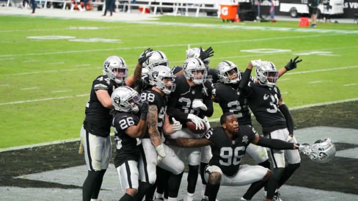 Nov 15, 2020; Paradise, Nevada, USA; Las Vegas Raiders strong safety Jeff Heath (38) celebrates with teammates after intercepting a pass in the second quarter against the Denver Broncos at Allegiant Stadium. Mandatory Credit: Kirby Lee-USA TODAY Sports