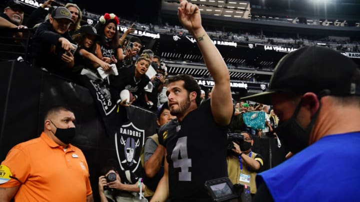 Oct 24, 2021; Paradise, Nevada, USA; Las Vegas Raiders quarterback Derek Carr (4) celebrates the 33-22 victory against the Philadelphia Eagles at Allegiant Stadium. Mandatory Credit: Gary A. Vasquez-USA TODAY Sports