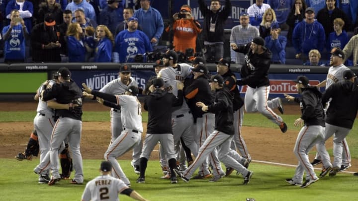 Oct 29, 2014; Kansas City, MO, USA; San Francisco Giants fans celebrate on the field after defeating the Kansas City Royals during game seven of the 2014 World Series at Kauffman Stadium. Mandatory Credit: Christopher Hanewinckel-USA TODAY Sports