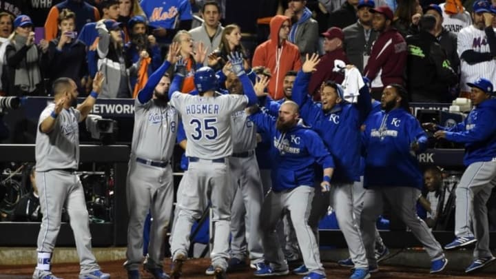 Nov 1, 2015; New York City, NY, USA; Kansas City Royals first baseman Eric Hosmer (35) celebrates with teammates after scoring a run against the New York Mets in the 9th inning in game five of the World Series at Citi Field. Mandatory Credit: Robert Deutsch-USA TODAY Sports