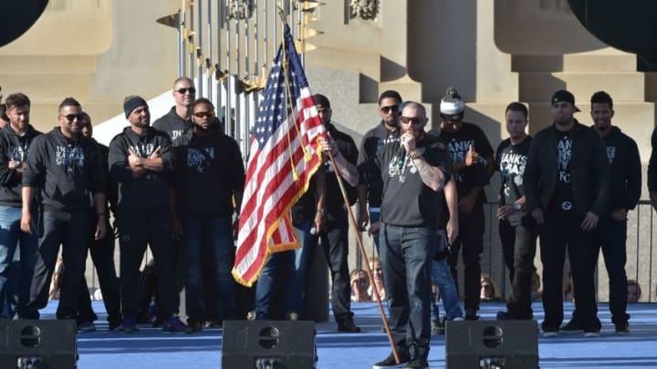 Nov 3, 2015; Kansas City, MO, USA; Kansas City Royals player Jonny Gomes speaks to fans during the World Series victory celebration on stage at Union Station. Mandatory Credit: Denny Medley-USA TODAY Sports