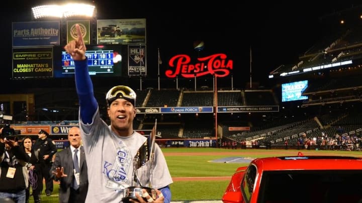 Nov 1, 2015; New York City, NY, USA; Kansas City Royals catcher Salvador Perez is presented with the series MVP award and a car after defeating the New York Mets in game five of the World Series at Citi Field. The Royals win the World Series four games to one. Mandatory Credit: Jeff Curry-USA TODAY Sports