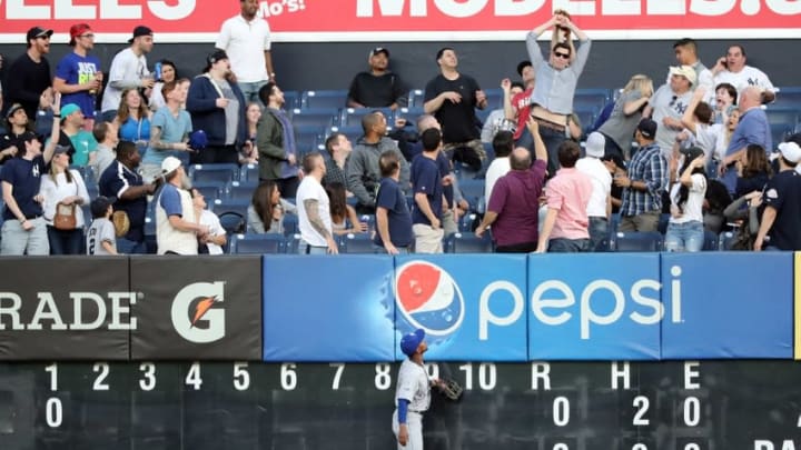 May 12, 2016; Bronx, NY, USA; Kansas City Royals center fielder Jarrod Dyson (1) watches a fan catch the home run ball hit by New York Yankees second baseman Starlin Castro (not pictured) during the first inning at Yankee Stadium. Mandatory Credit: Anthony Gruppuso-USA TODAY Sports