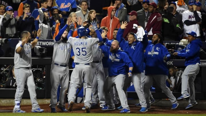 Nov 1, 2015; New York City, NY, USA; Kansas City Royals first baseman Eric Hosmer (35) celebrates with teammates after scoring a run against the New York Mets in the 9th inning in game five of the World Series at Citi Field. Mandatory Credit: Robert Deutsch-USA TODAY Sports