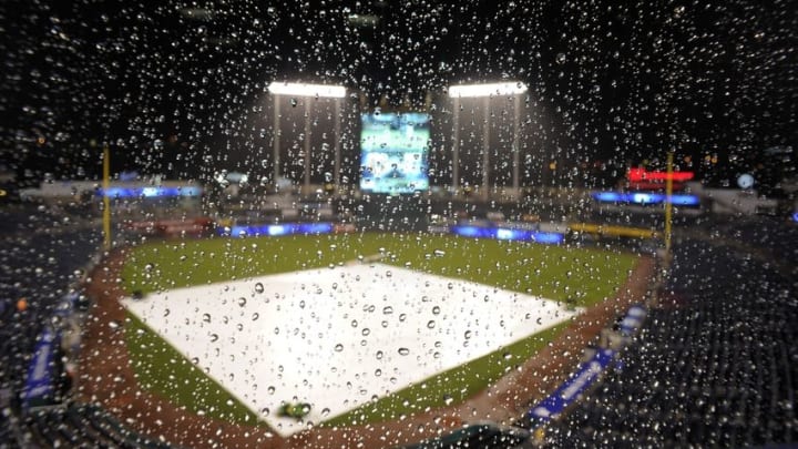 Aug 19, 2016; Kansas City, MO, USA; Water sits on the window of the press box window during a rain delay in the fifth inning of the game between the Kansas City Royals and Minnesota Twins at Kauffman Stadium. Mandatory Credit: John Rieger-USA TODAY Sports