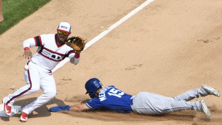 CHICAGO, IL - AUGUST 19: Whit Merrifield #15 of the Kansas City Royals steals second base as Yolmer Sanchez #5 of the Chicago White Sox makes a late tag during the fourth inning on August 19, 2018 at Guaranteed Rate Field in Chicago, Illinois. (Photo by David Banks/Getty Images)