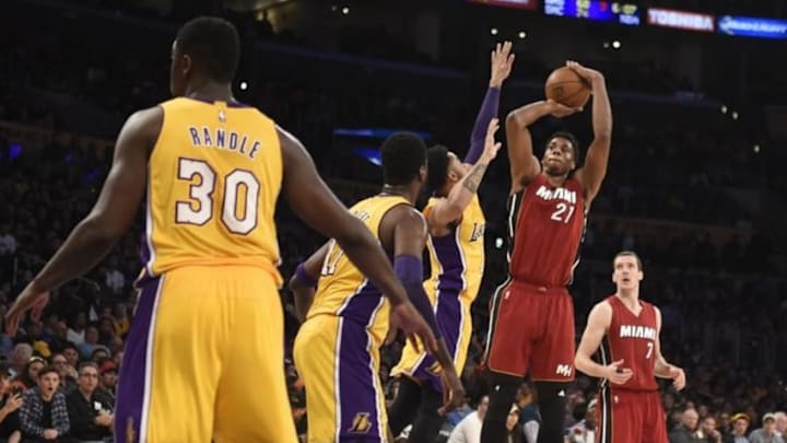 Mar 30, 2016; Los Angeles, CA, USA; Miami Heat center Hassan Whiteside (21) shoots over the Los Angeles Lakers defense during first half at Staples Center. Mandatory Credit: Richard Mackson-USA TODAY Sports