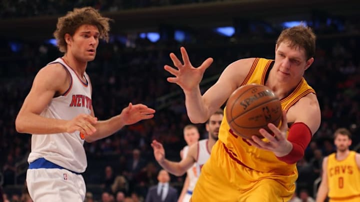 Mar 26, 2016; New York, NY, USA; Cleveland Cavaliers center Timofey Mozgov (20) in action against New York Knicks center Robin Lopez (8) at Madison Square Garden. Mandatory Credit: Brad Penner-USA TODAY Sports