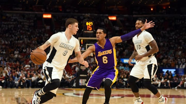 Dec 22, 2016; Miami, FL, USA; Miami Heat guard Tyler Johnson (8) is guarded by Los Angeles Lakers guard Jordan Clarkson (6) during the second half at American Airlines Arena. Mandatory Credit: Steve Mitchell-USA TODAY Sports
