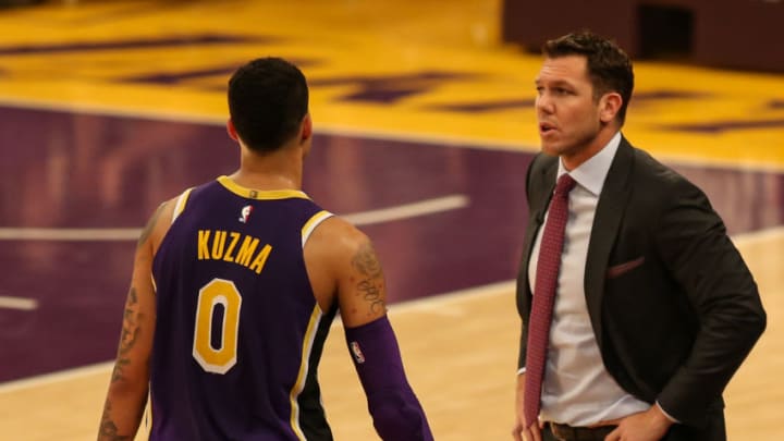LOS ANGELES, CA - FEBRUARY 27: Lakers coach Luke Walton chats with Los Angeles Lakers Forward Kyle Kuzma (0) during the first half of the New Orleans Pelicans versus Los Angeles Lakers game on February 27, 2019, at Staples Center in Los Angeles, CA. (Photo by Icon Sportswire)