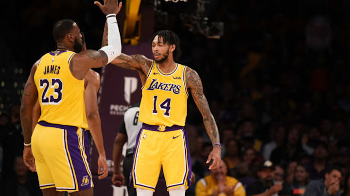LOS ANGELES, CA - OCTOBER 4: LeBron James #23 and Brandon Ingram #14 of the Los Angeles Lakers react during a pre-season game against the Sacramento Kings on October 4, 2018 at Staples Center, in Los Angeles, California. NOTE TO USER: User expressly acknowledges and agrees that, by downloading and/or using this Photograph, user is consenting to the terms and conditions of the Getty Images License Agreement. Mandatory Copyright Notice: Copyright 2018 NBAE (Photo by Adam Pantozzi/NBAE via Getty Images)