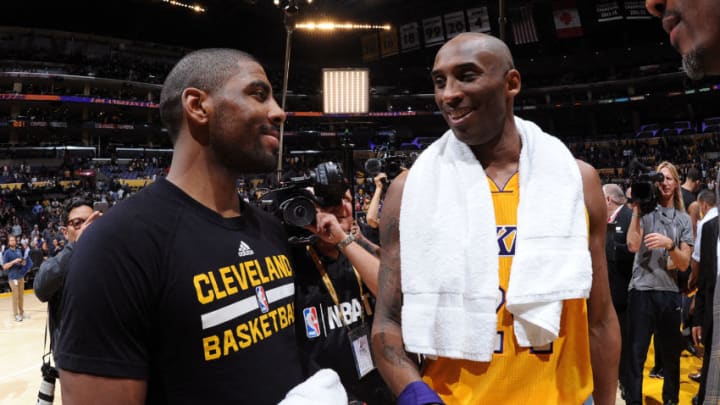 LOS ANGELES, CA - MARCH 10: Kyrie Irving #2 of the Cleveland Cavaliers talks to Kobe Bryant #24 of the Los Angeles Lakers after the game at STAPLES Center on March 10, 2016 in Los Angeles, California. NOTE TO USER: User expressly acknowledges and agrees that, by downloading and/or using this Photograph, user is consenting to the terms and conditions of the Getty Images License Agreement. Mandatory Copyright Notice: Copyright 2016 NBAE (Photo by Andrew D. Bernstein/NBAE via Getty Images)