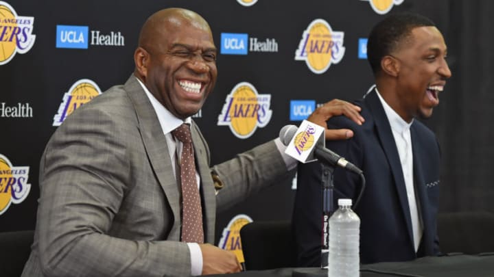 EL SEGUNDO, CA- JULY 18: President of Basketball Operations, Magic Johnson and General Manager, Rob Pelinka introduce Kentavious Caldwell-Pope (Photo by Andrew D. Bernstein/NBAE via Getty Images)