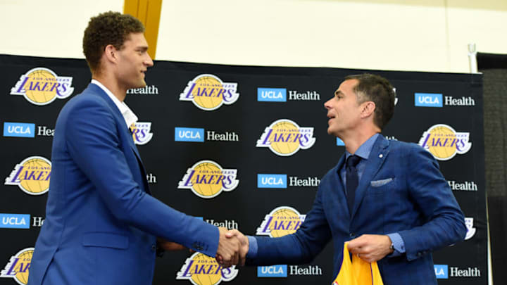 EL SEGUNDO, CA - JUNE 28: Rob Pelinka of the Los Angeles Lakers shakes hands with Brook Lopez after introducing him at a press conference on June 28, 2017 in El Segundo, California. NOTE TO USER: User expressly acknowledges and agrees that, by downloading and/or using this photograph, user is consenting to the terms and conditions of the Getty Images License Agreement. Mandatory Copyright Notice: Copyright 2017 NBAE (Photo by Andrew D. Bernstein/NBAE via Getty Images)
