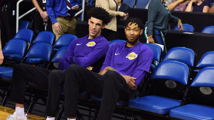 LOS ANGELES, CA - OCTOBER 4: Brandon Ingram #14 and Lonzo Ball #2 of the Los Angeles Lakers looks on before the game against the Denver Nuggets on October 4, 2017 at Citizens Business Bank Arena in Los Angeles, California. NOTE TO USER: User expressly acknowledges and agrees that, by downloading and/or using this Photograph, user is consenting to the terms and conditions of the Getty Images License Agreement. Mandatory Copyright Notice: Copyright 2017 NBAE (Photo by Andrew D. Bernstein/NBAE via Getty Images) LOS ANGELES, CA - OCTOBER 4: Brandon Ingram #14 and Lonzo Ball #2 of the Los Angeles Lakers looks on before the game against the Denver Nuggets on October 4, 2017 at Citizens Business Bank Arena in Los Angeles, California. NOTE TO USER: User expressly acknowledges and agrees that, by downloading and/or using this Photograph, user is consenting to the terms and conditions of the Getty Images License Agreement. Mandatory Copyright Notice: Copyright 2017 NBAE (Photo by Andrew D. Bernstein/NBAE via Getty Images)