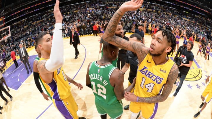 LOS ANGELES, CA - JANUARY 23: Kyle Kuzma #0 and Brandon Ingram #14 of the Los Angeles Lakers exchange high fives after the game against the Boston Celtics on January 23, 2018 at STAPLES Center in Los Angeles, California. NOTE TO USER: User expressly acknowledges and agrees that, by downloading and/or using this Photograph, user is consenting to the terms and conditions of the Getty Images License Agreement. Mandatory Copyright Notice: Copyright 2018 NBAE (Photo by Andrew D. Bernstein/NBAE via Getty Images)