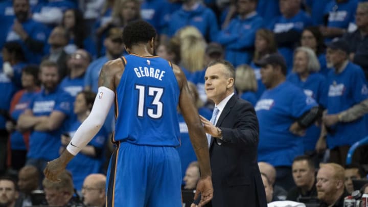 OKLAHOMA CITY, OK - APRIL 25: Billy Donovan coach of the Oklahoma City Thunder talks to Paul George