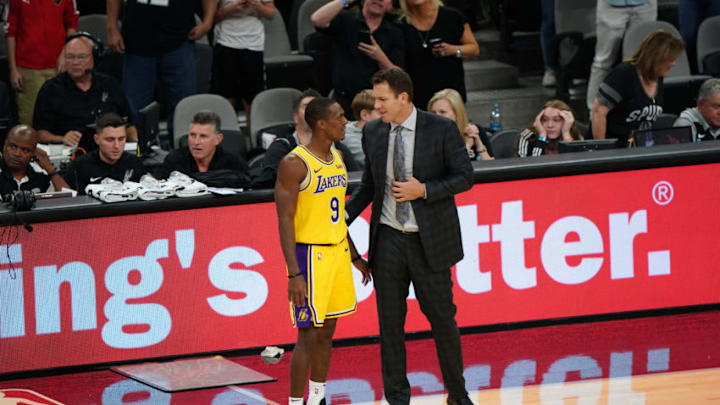 SAN ANTONIO, TX - OCTOBER 27: Rajon Rondo #9 of the Los Angeles Lakers and Head Coach Luke Walton talk during the game against the San Antonio Spurs on October 27, 2018 at the AT&T Center in San Antonio, Texas. NOTE TO USER: User expressly acknowledges and agrees that, by downloading and or using this photograph, user is consenting to the terms and conditions of the Getty Images License Agreement. Mandatory Copyright Notice: Copyright 2018 NBAE (Photos by Darren Carroll/NBAE via Getty Images) SAN ANTONIO, TX - OCTOBER 27: Rajon Rondo #9 of the Los Angeles Lakers and Head Coach Luke Walton talk during the game against the San Antonio Spurs on October 27, 2018 at the AT&T Center in San Antonio, Texas. NOTE TO USER: User expressly acknowledges and agrees that, by downloading and or using this photograph, user is consenting to the terms and conditions of the Getty Images License Agreement. Mandatory Copyright Notice: Copyright 2018 NBAE (Photos by Darren Carroll/NBAE via Getty Images)