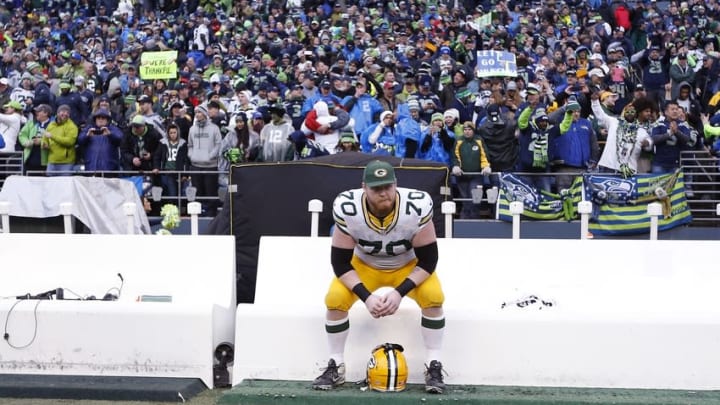 January 18, 2015; Seattle, WA, USA; Green Bay Packers guard T.J. Lang (70) reacts following the 28-22 loss against the Seattle Seahawks in the NFC Championship game at CenturyLink Field. Joe Nicholson-USA TODAY Sports