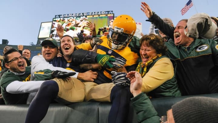 Oct 18, 2015; Green Bay, WI, USA; Green Bay Packers wide receiver James Jones (89) celebrates with fans after scoring a touchdown in the third quarter against the San Diego Chargers at Lambeau Field. Benny Sieu-USA TODAY Sports