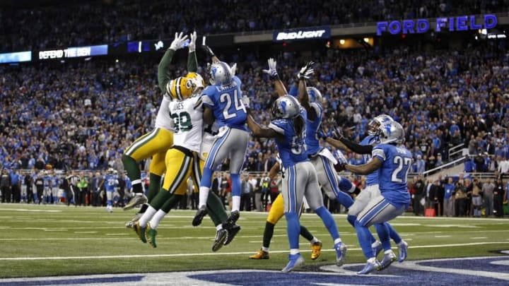 Green Bay Packers quarterback Aaron Rodgers (not pictured) completes a touchdown pass to tight end Richard Rodgers (82) during the fourth quarter with no time remaining against the Detroit Lions at Ford Field. Raj Mehta-USA TODAY Sports