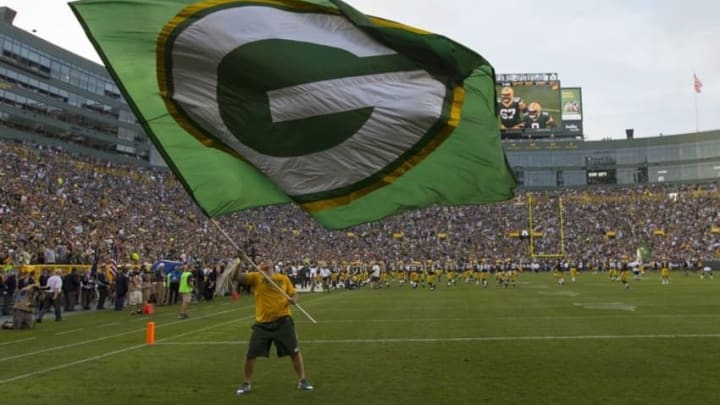 Aug 18, 2016; Green Bay, WI, USA; The Green Bay Packers take the field prior to the game against the Oakland Raiders at Lambeau Field. Mandatory Credit: Jeff Hanisch-USA TODAY Sports