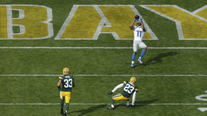 Sep 25, 2016; Green Bay, WI, USA; Detroit Lions wide receiver Marvin Jones (11) scores a touchdown on a reception during the fourth quarter of their game against the Green Bay Packers at Lambeau Field. Mandatory Credit: Mark Hoffman/Milwaukee Journal Sentinel via USA TODAY Sports