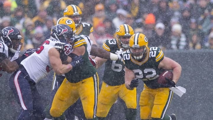 Dec 4, 2016; Green Bay, WI, USA; Green Bay Packers fullback Aaron Ripkowski (22) rushes with the football during the second quarter against the Houston Texans at Lambeau Field. Mandatory Credit: Jeff Hanisch-USA TODAY Sports