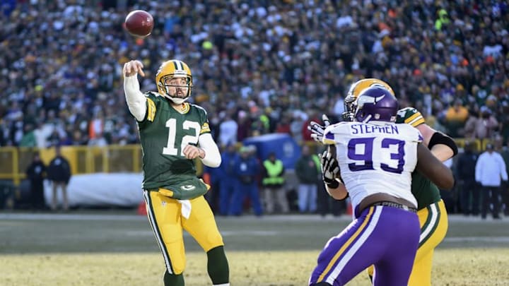 Dec 24, 2016; Green Bay, WI, USA; Green Bay Packers quarterback Aaron Rodgers (12) passes for a touchdown to wide receiver Jordy Nelson (not pictured) in the second quarter during the game against the Minnesota Vikings at Lambeau Field. Mandatory Credit: Benny Sieu-USA TODAY Sports