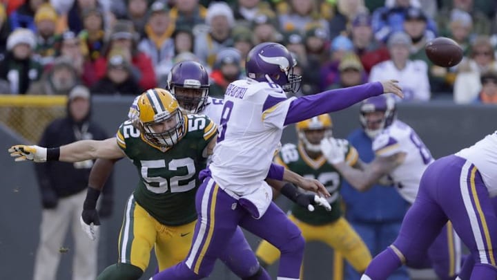 Dec 24, 2016; Green Bay, WI, USA; Green Bay Packers outside linebacker Clay Matthews (52) pressures Minnesota Vikings quarterback Sam Bradford (8) in the second quarter at Lambeau Field. Mandatory Credit: Adam Wesley/USA TODAY NETWORK-Wisconsin via USA TODAY Sports