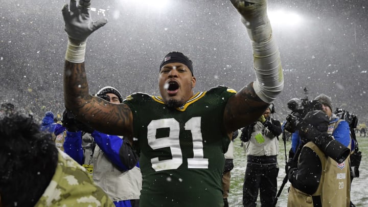 GREEN BAY, WISCONSIN – NOVEMBER 10: Preston Smith #91 of the Green Bay Packers reacts after the win against the Carolina Panthers at Lambeau Field on November 10, 2019 in Green Bay, Wisconsin. (Photo by Quinn Harris/Getty Images)