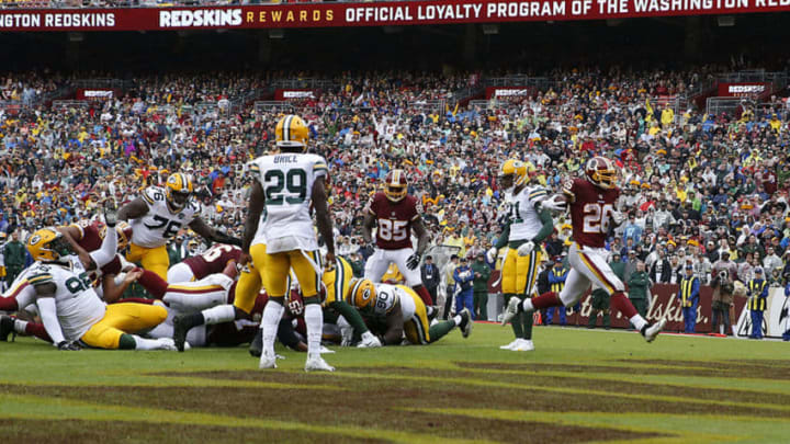 LANDOVER, MD - SEPTEMBER 23: Adrian Peterson #26 of the Washington Redskins rushes for a touchdown in the first quarter against the Green Bay Packers at FedExField on September 23, 2018 in Landover, Maryland. (Photo by Todd Olszewski/Getty Images)