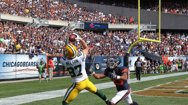 CHICAGO, IL – SEPTEMBER 28: Jordy Nelson #87 of the Green Bay Packers catches a touchdown pass in front of Kyle Fuller #23 of the Chicago Bears during the second quarter at Soldier Field on September 28, 2014 in Chicago, Illinois. The Bears defetaed the Packers 38-17. (Photo by Jonathan Daniel/Getty Images)