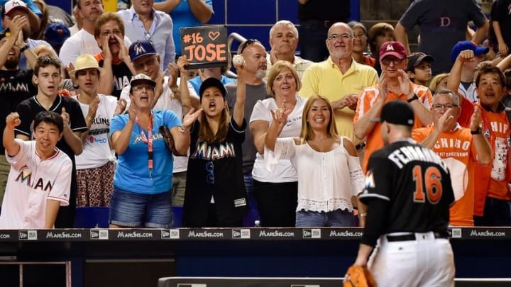 Jul 22, 2016; Miami, FL, USA; Fans cheer on as Miami Marlins starting pitcher Jose Fernandez (16) walks towards the dugout during the fifth inning against the New York Mets at Marlins Park. Mandatory Credit: Steve Mitchell-USA TODAY Sports