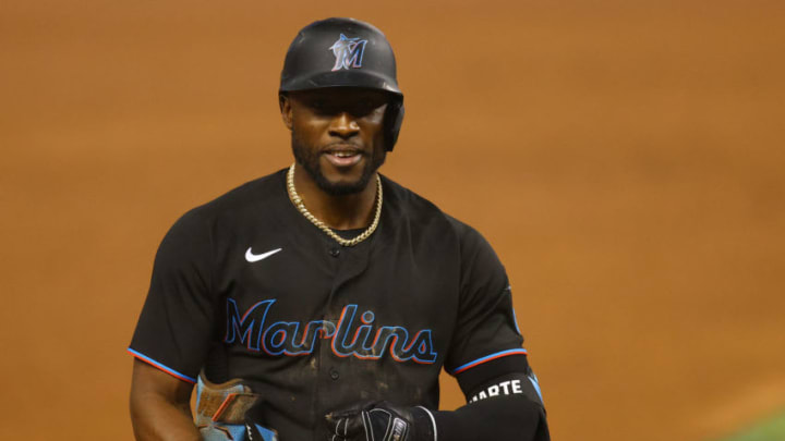 MIAMI, FLORIDA - APRIL 03: Starling Marte #6 of the Miami Marlins reacts to getting in base against the Tampa Bay Rays at loanDepot park on April 03, 2021 in Miami, Florida. (Photo by Mark Brown/Getty Images)
