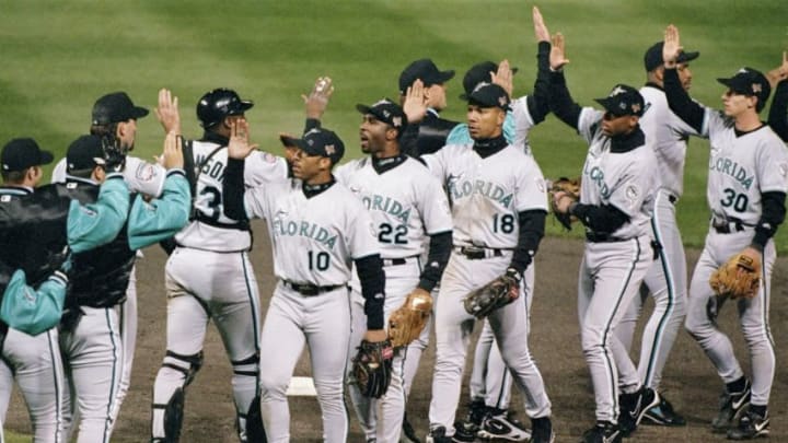 23 Oct 1997: Outfielder Gary Sheffield of the Florida Marlins (center) greets other players during the fifth game of the World Series against the Cleveland Indians at Jacobs Field in Cleveland, Ohio. The Marlins won the game 8-7. Mandatory Credit: Jed Jacobsohn /Allsport