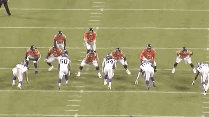 Number 98 stunts into the center, who is keyed in on 50. This allows 98 to walk in for an easy sack.