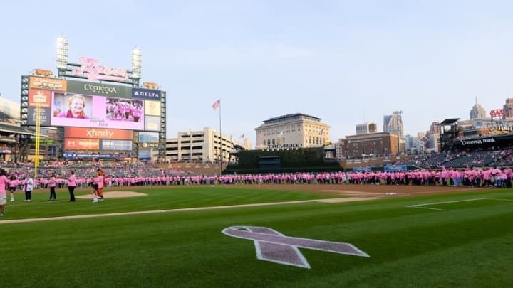 Sep 18, 2015; Detroit, MI, USA; Cancer survivors line the field prior to the game between the Detroit Tigers and the Kansas City Royals at Comerica Park. Mandatory Credit: Rick Osentoski-USA TODAY Sports
