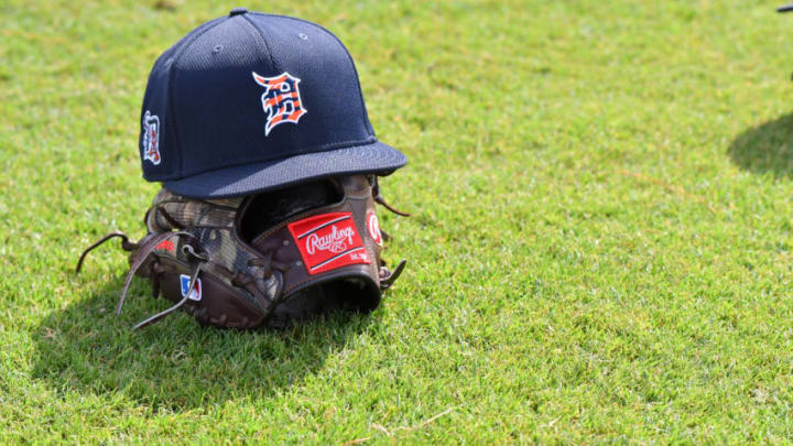 LAKELAND, FL - A detailed view of a Detroit Tigers baseball hat and Rawlings glove. (Photo by Mark Cunningham/MLB Photos via Getty Images)