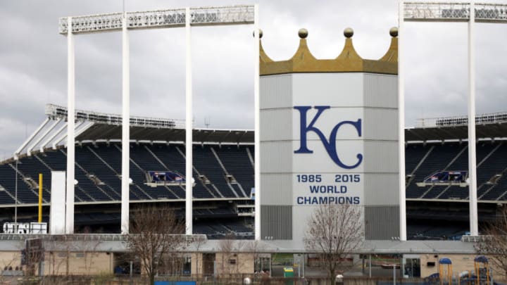 KANSAS CITY, MO - MARCH 19: A jogger runs past an empty Kauffman Stadium, home of the Kansas City Royals, as Major League Baseball has shut down competition due to coronavirus on March 19, 2020 in Kansas City, Missouri. The NBA, NHL, NCAA and MLB have all announced cancellations or postponements of events because of COVID-19. (Photo by Jamie Squire/Getty Images)